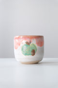 Cup called “a strong tree inside the apple house”
