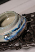 Pot called “Flip the Pillow”