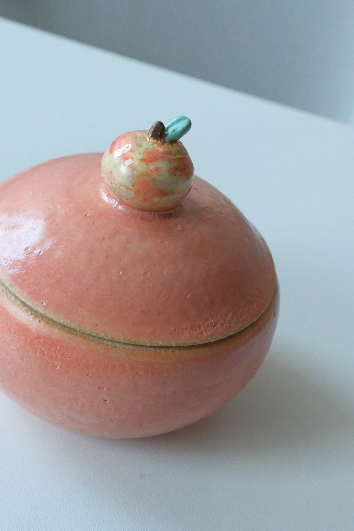 Pot called “green apple inside the mandarin”