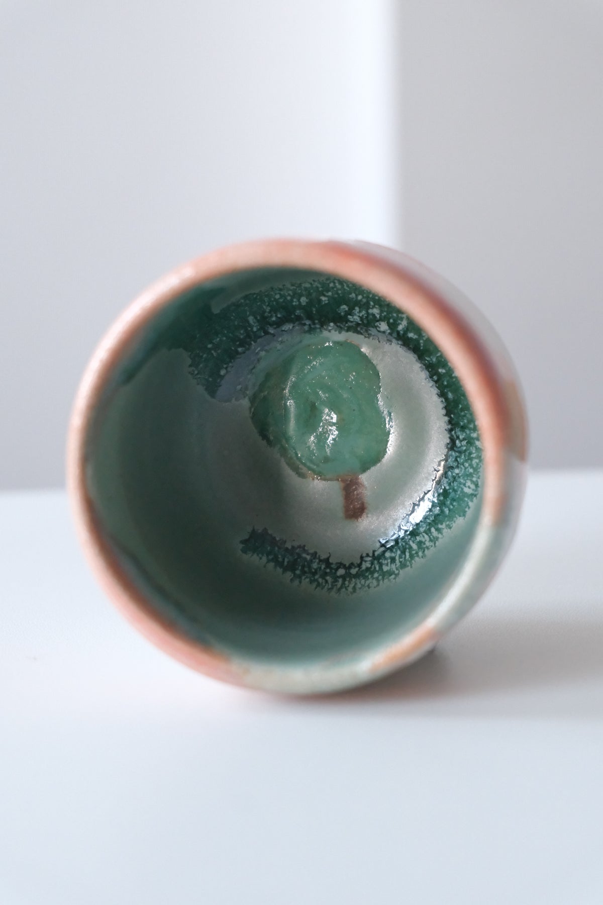 Cup called “a strong tree inside the apple house”