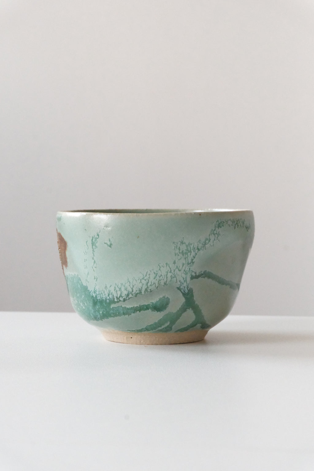 Cup called “coffee flower with blue eyes”