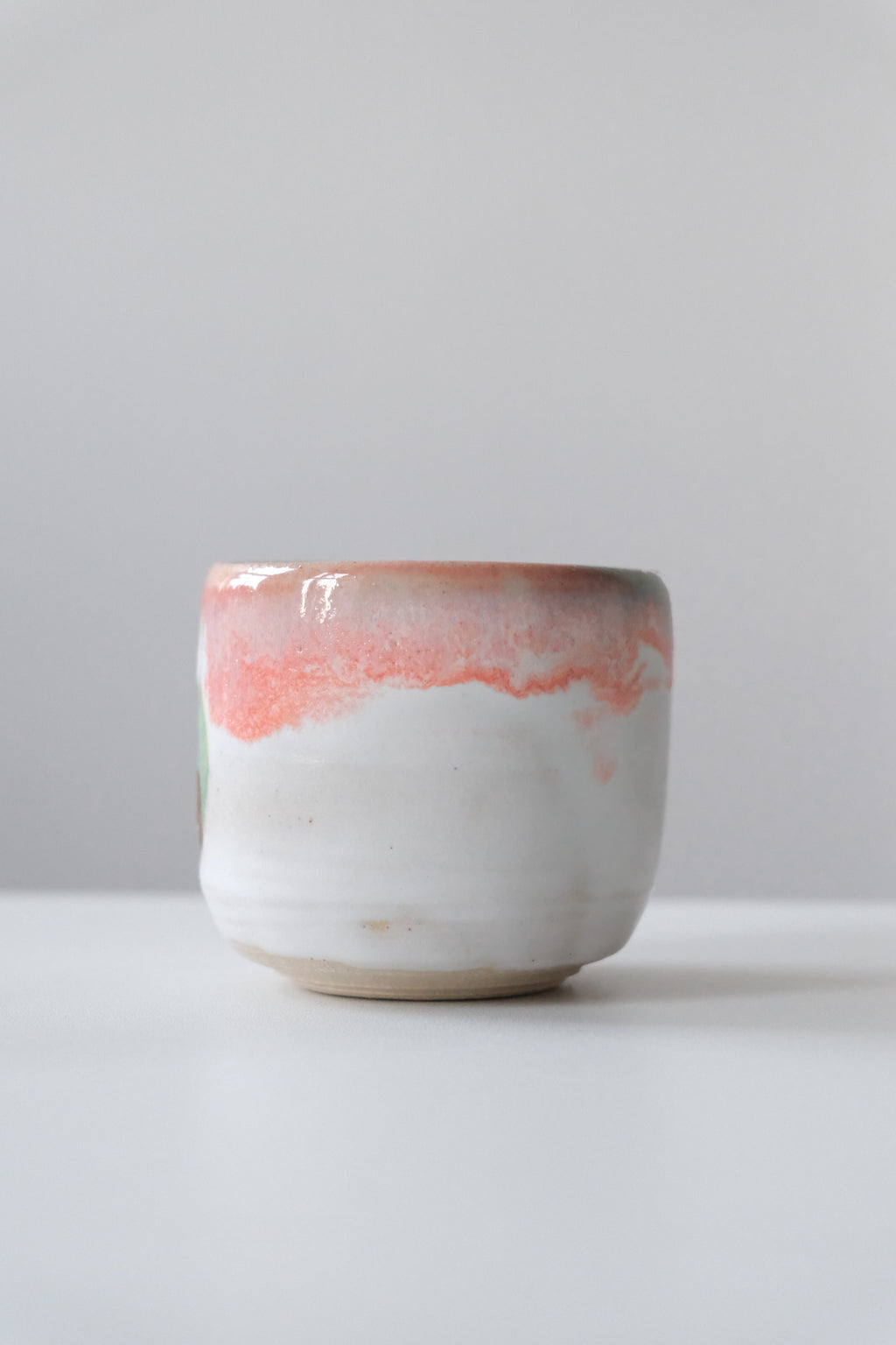 Cup called “a strong tree inside the apple house”