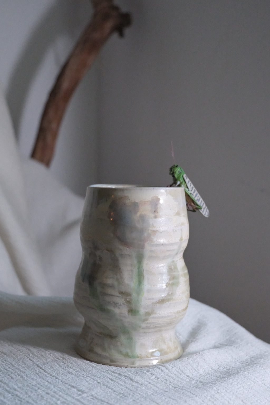 Vase called “the pearl and the glasshopper”