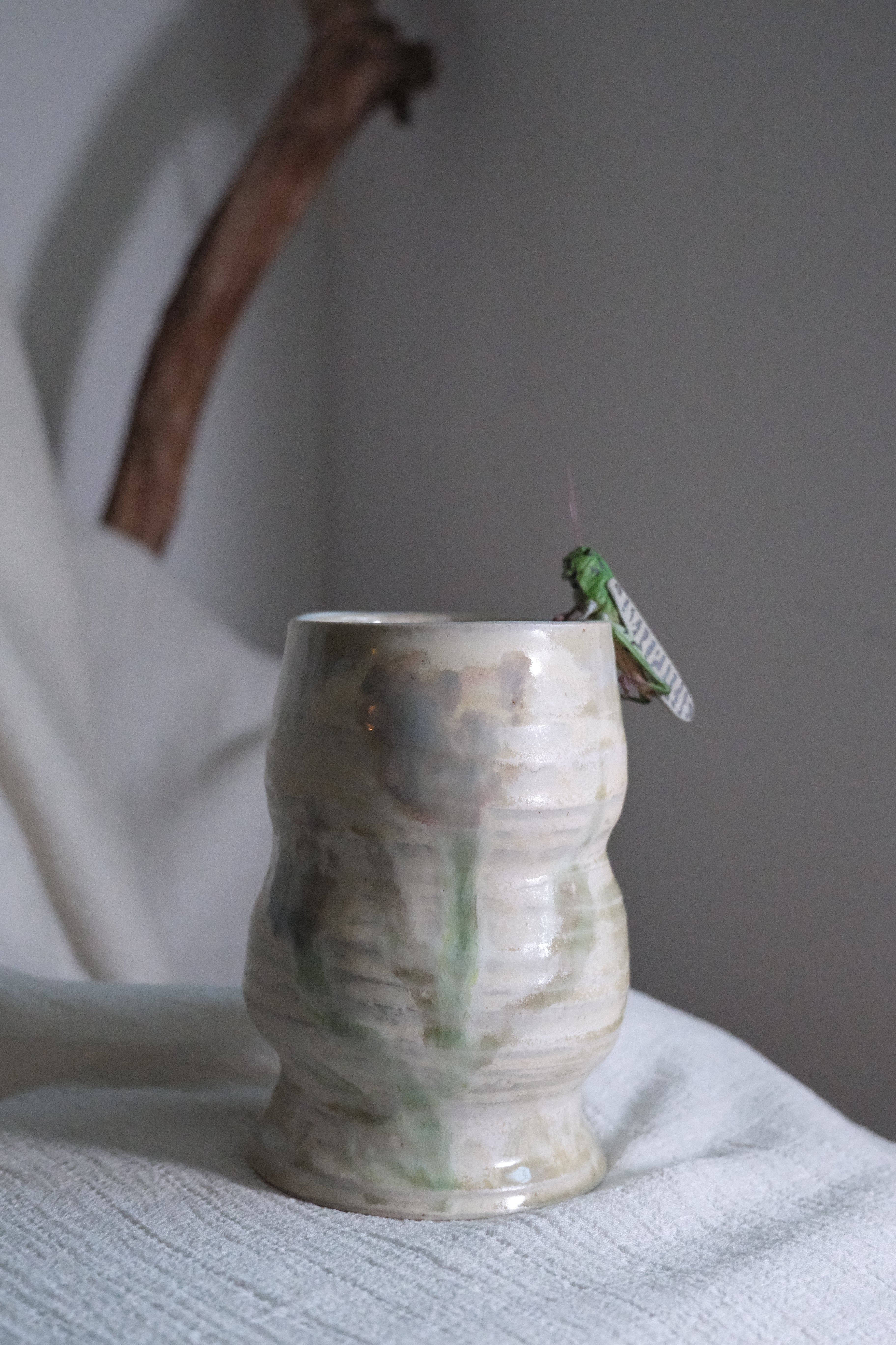 Vase called “the pearl and the glasshopper”