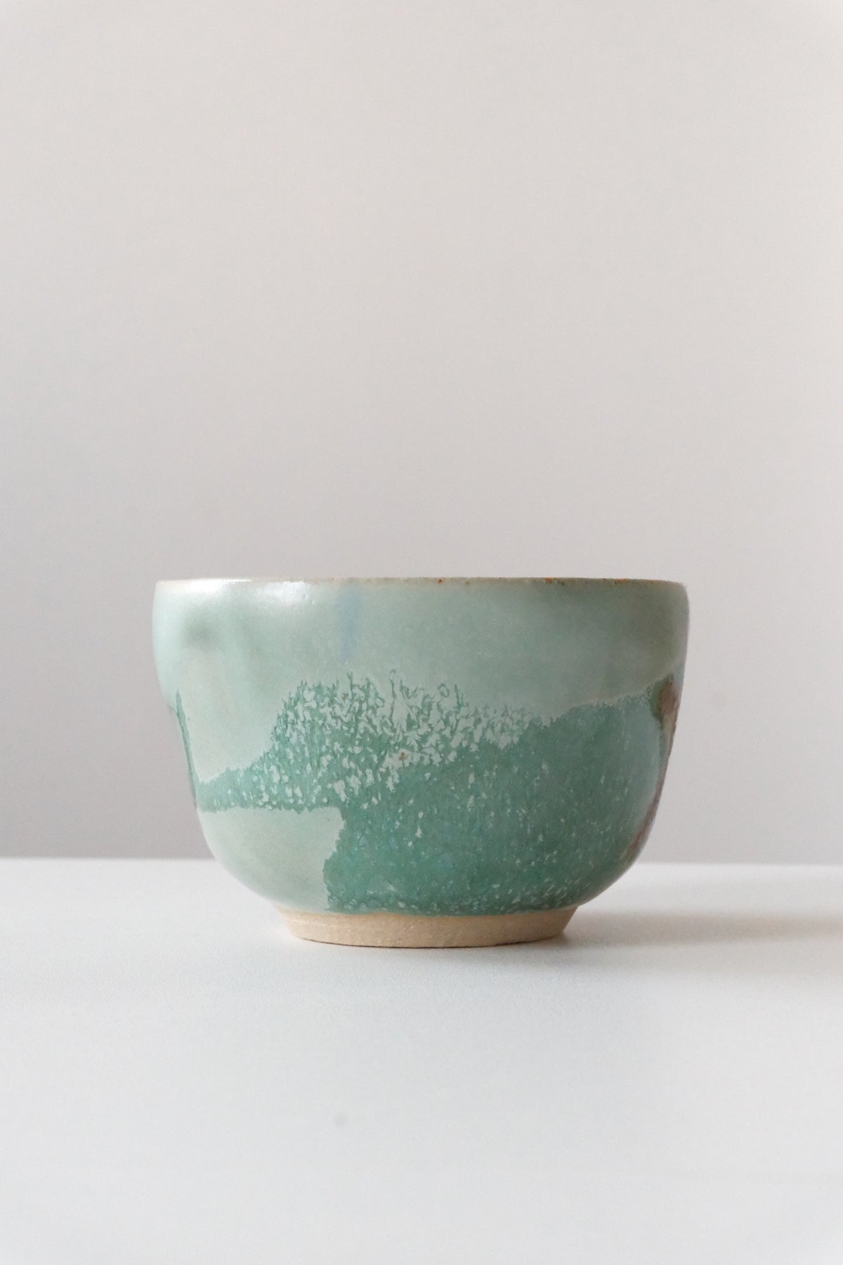 Cup called “coffee flower with blue eyes”