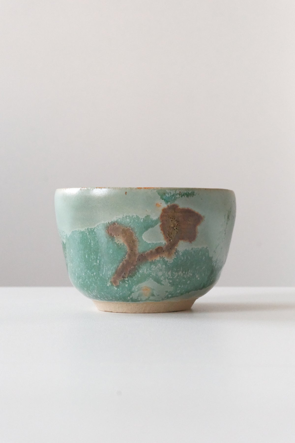 Cup called “coffee flower with blue eyes”