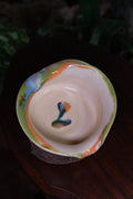 Small bowl called “my favourite flavour of ice cream is pistachio and rum”