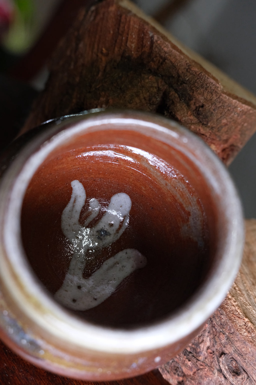 A pot called “hello from the bottom”